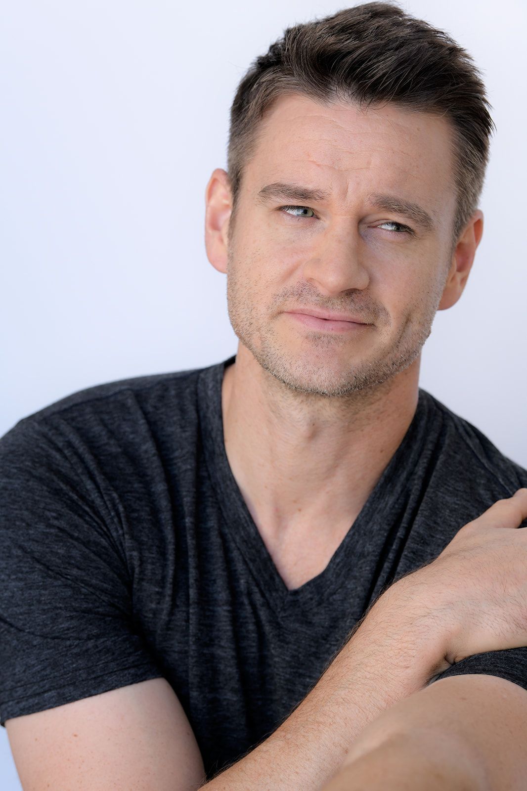 Clark Moore — casual headshot, v-neck